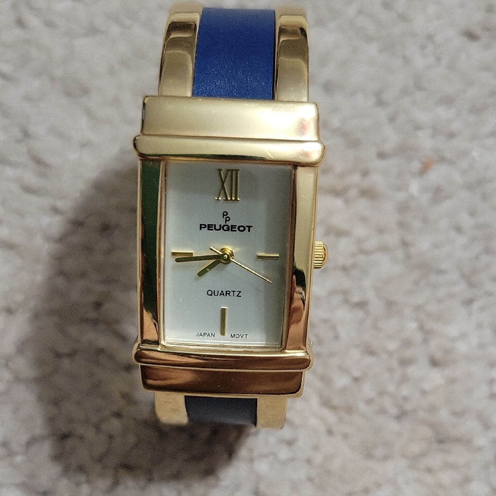 Peugeot Gold Watch with Blue Band